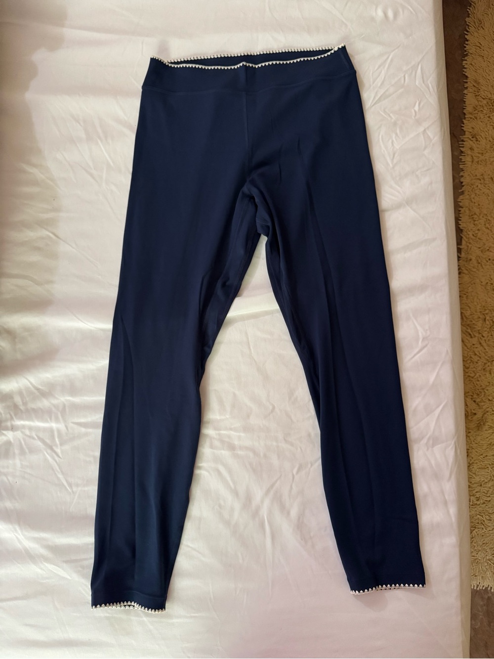 Lululemon excellent condition 25” navy with white stitching size 10